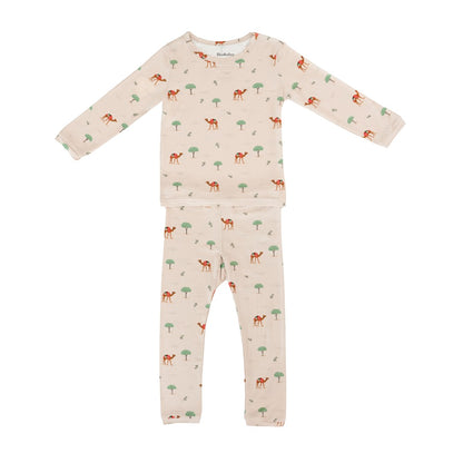 Hushabye camel print bamboo rayon pajamas for kids. Long sleeve top and pants in a light beige with a desert camel and tree pattern.